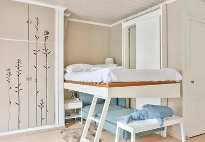 Un ou plusieurs lits dans un hébergement de l'établissement GuestReady - Lovely Minimalist Studio in Plaisance