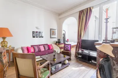Coin salon dans l'établissement GuestReady - Très bel Appartement confortable