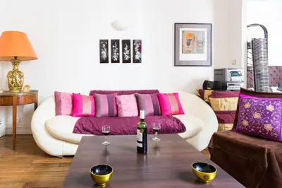 Coin salon dans l'établissement GuestReady - Très bel Appartement confortable