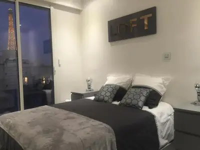 Un ou plusieurs lits dans un hébergement de l'établissement Luxury Eiffel Tower view - Paris 16