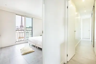 Un ou plusieurs lits dans un hébergement de l'établissement Luxury Eiffel Tower view - Paris 16