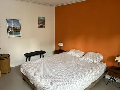 Un ou plusieurs lits dans un hébergement de l'établissement Lovely large apartment (4p) near Montparnasse