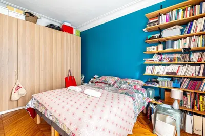 Un ou plusieurs lits dans un hébergement de l'établissement GuestReady - Loveliness near Pont Mirabeau