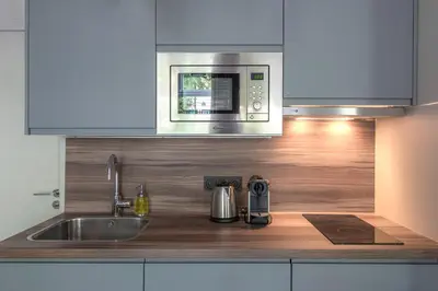 Cuisine ou kitchenette dans l'établissement Citihome Alésia