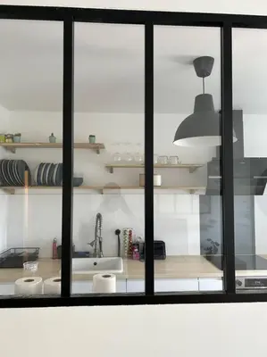 Cuisine ou kitchenette dans l'établissement Appart Cosy de 52m2