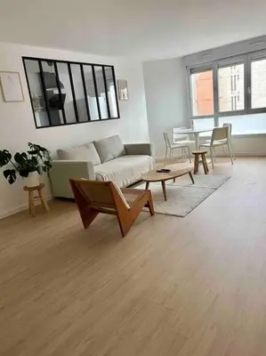 Coin salon dans l'établissement Appart Cosy de 52m2