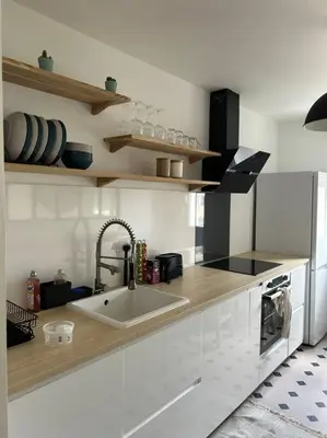 Cuisine ou kitchenette dans l'établissement Appart Cosy de 52m2