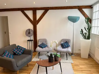 Coin salon dans l'établissement Loft duplex d'exception de 120m2 Paul Bert