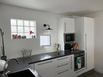 Cuisine ou kitchenette dans l'établissement Loft duplex d'exception de 120m2 Paul Bert