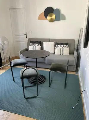Coin salon dans l'établissement Au centre de paris - 4pax