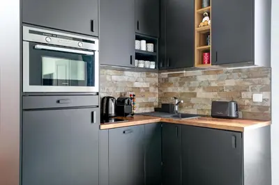 Cuisine ou kitchenette dans l'établissement Au centre de paris - 4pax