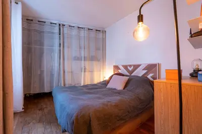 Un ou plusieurs lits dans un hébergement de l'établissement Appartement parisien (12ème)