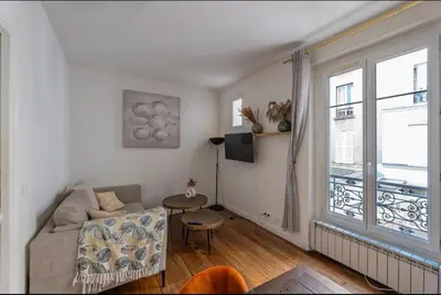 Coin salon dans l'établissement Appartement parisien (12ème)