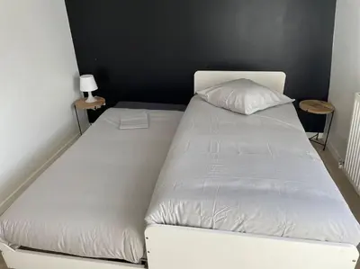 Un ou plusieurs lits dans un hébergement de l'établissement Appartement 3p Ivry