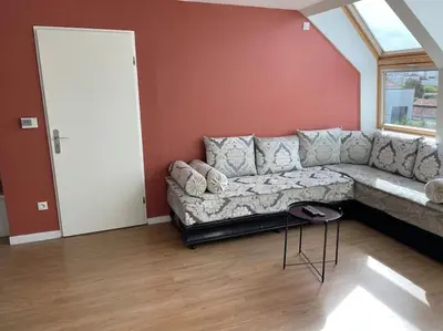 Coin salon dans l'établissement Appartement 3p Ivry