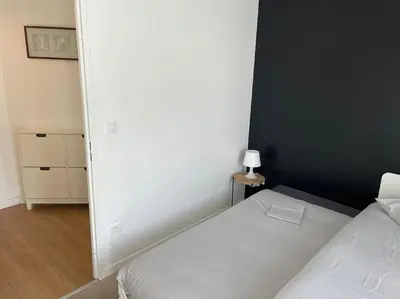 Un ou plusieurs lits dans un hébergement de l'établissement Appartement 3p Ivry