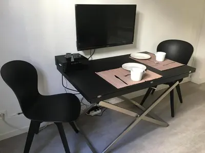 Télévision ou salle de divertissement dans l'établissement Charmant logement près Parc Buttes Chaumont