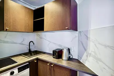 Cuisine ou kitchenette dans l'établissement Beautiful 2BDR near the Eiffel Tower