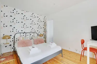 Un ou plusieurs lits dans un hébergement de l'établissement Charming appartement - 1BD-4P - Batignolles