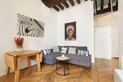 Coin salon dans l'établissement Louvre & Chatelet-1BR Cosy Apt