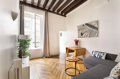 Coin salon dans l'établissement Louvre & Chatelet-1BR Cosy Apt