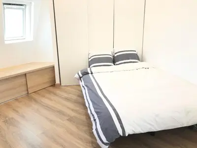 Un ou plusieurs lits dans un hébergement de l'établissement Élégance Haussmanienne - Studio moderne au cœur de Paris