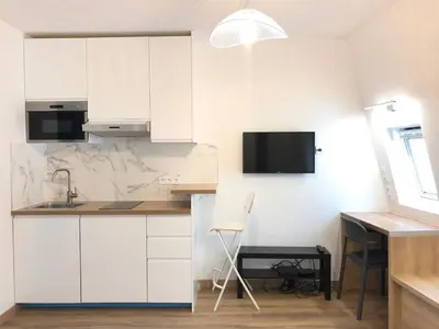 Cuisine ou kitchenette dans l'établissement Élégance Haussmanienne - Studio moderne au cœur de Paris