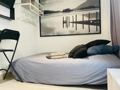 Un ou plusieurs lits dans un hébergement de l'établissement Calm And Cozy