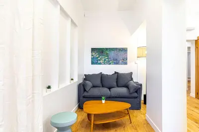 Coin salon dans l'établissement GuestReady - Serene stay near Champ de Mars