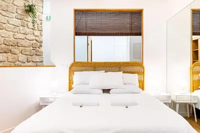 Un ou plusieurs lits dans un hébergement de l'établissement GuestReady - Serene stay near Champ de Mars