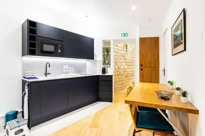 Cuisine ou kitchenette dans l'établissement GuestReady - Serene stay near Champ de Mars