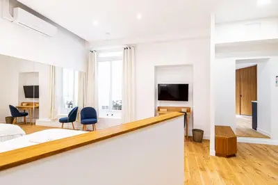 Télévision ou salle de divertissement dans l'établissement GuestReady - Serene stay near Champ de Mars