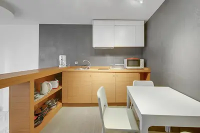 Cuisine ou kitchenette dans l'établissement Élégance confort à l’Odéon by Weekome