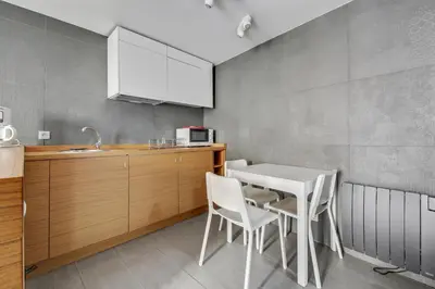 Cuisine ou kitchenette dans l'établissement Élégance confort à l’Odéon by Weekome