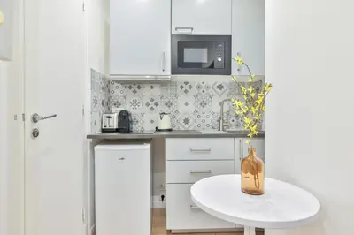 Cuisine ou kitchenette dans l'établissement Charming studio - 2P - Eiffel Tower