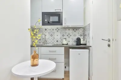 Cuisine ou kitchenette dans l'établissement Charming studio - 2P - Eiffel Tower