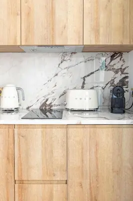 Cuisine ou kitchenette dans l'établissement La Suite du Marais