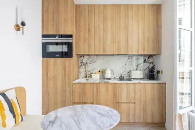 Cuisine ou kitchenette dans l'établissement La Suite du Marais