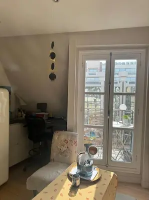 Coin salon dans l'établissement Cosy appartement lumineux Montparnasse