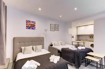 Un ou plusieurs lits dans un hébergement de l'établissement 325 Suite Greta - Superb apartment in Paris