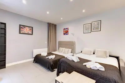 Un ou plusieurs lits dans un hébergement de l'établissement 325 Suite Greta - Superb apartment in Paris