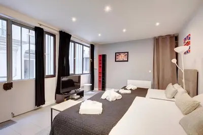 Un ou plusieurs lits dans un hébergement de l'établissement 325 Suite Greta - Superb apartment in Paris