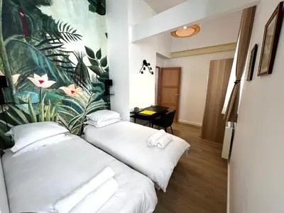 Un ou plusieurs lits dans un hébergement de l'établissement Apollinaire Luxury Loft - AC - Ideal Location - Peaceful