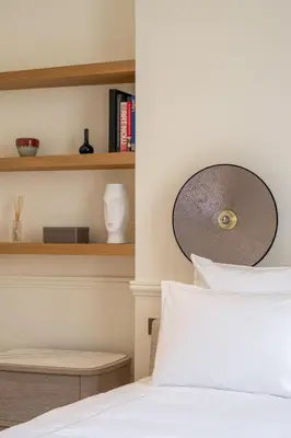 Un ou plusieurs lits dans un hébergement de l'établissement Appartement Avenue Montaigne - Paris Champs Elysées