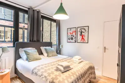 Un ou plusieurs lits dans un hébergement de l'établissement Fantastic Architect Loft - 10 guests - near Metro