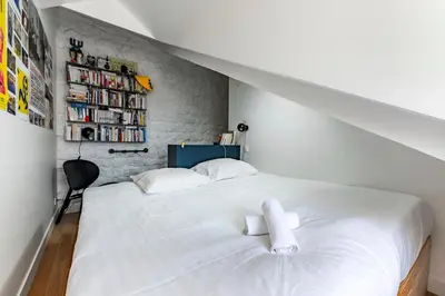 Un ou plusieurs lits dans un hébergement de l'établissement Veeve - Montparnasse Medley