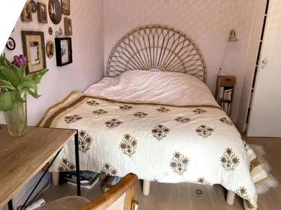 Un ou plusieurs lits dans un hébergement de l'établissement Appartement cosy dans le 9e