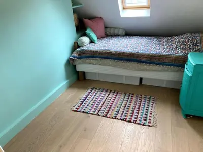 Un ou plusieurs lits dans un hébergement de l'établissement Appartement cosy dans le 9e
