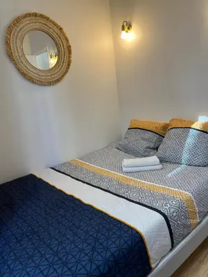 Un ou plusieurs lits dans un hébergement de l'établissement Appartement 2 pièces tout neuf Buttes Chaumont