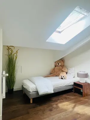 Un ou plusieurs lits dans un hébergement de l'établissement LOFT Triplex 300m² à 10 min PARIS/EXPO